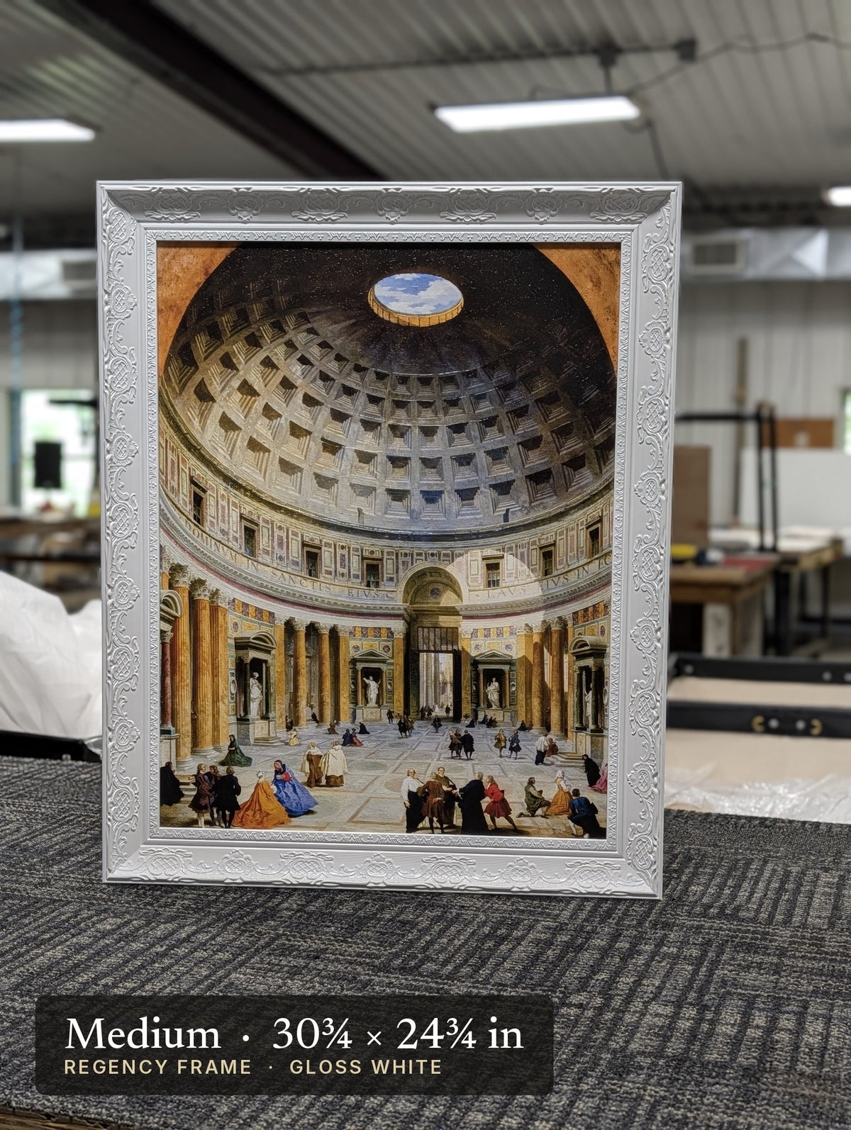 Regency Gloss White frame on a painting at our worktable